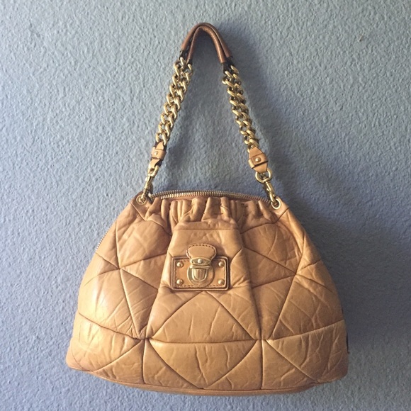 Quilted brown leather handbag