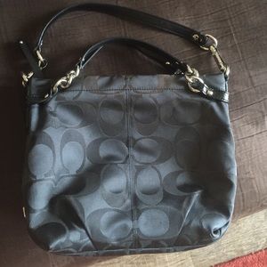 Black coach bag 12x11x5 inches.