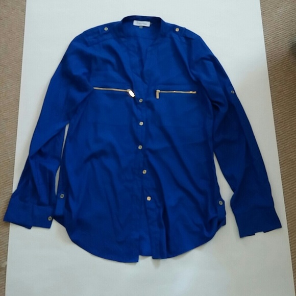 Royal blue button up roll tab blouse