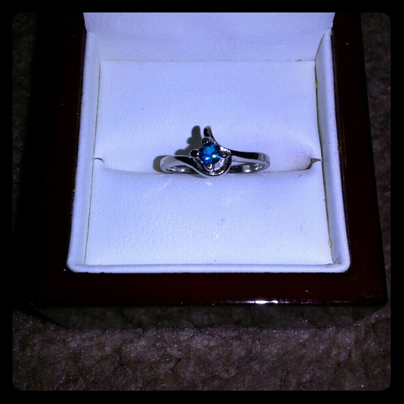 Silver plated ring size 6 with beautiful blue cz