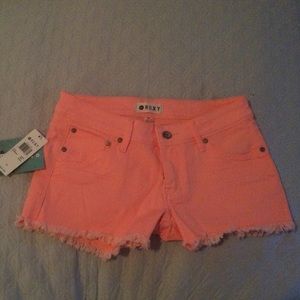 Roxy cutoff shorts. Size 27. Coral.