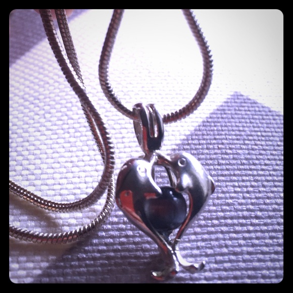 Silver tone necklace w/ 2 dolphins & stone pendant