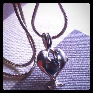 Silver tone necklace w/ 2 dolphins & stone pendant