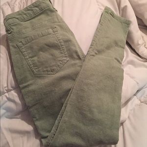 Green corduroy skinny jeans