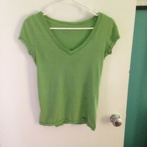 Green v-neck shirt