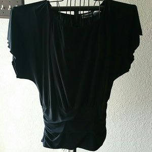 Black short sleeve top.