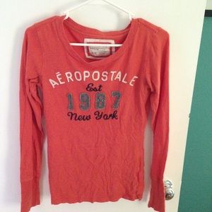 Orange long sleeved shirt