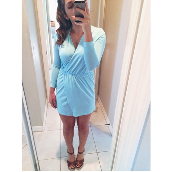 Light blue. Tight. Long sleeve dress