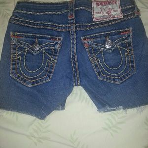 Cut up true religion shorts