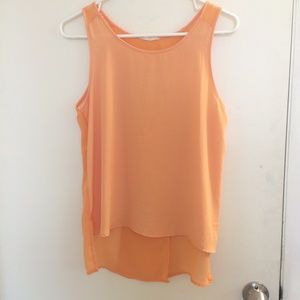Orange tank with overlapping fabric back