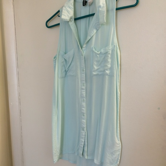 Light blue sleeveless button up