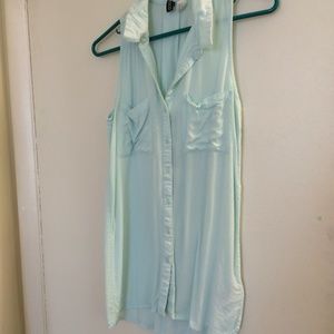Light blue sleeveless button up