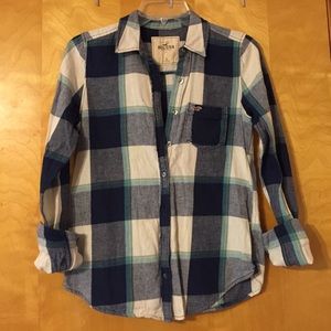 Blue plaid button up shirt.