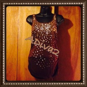 Brown sequent with gold shirt