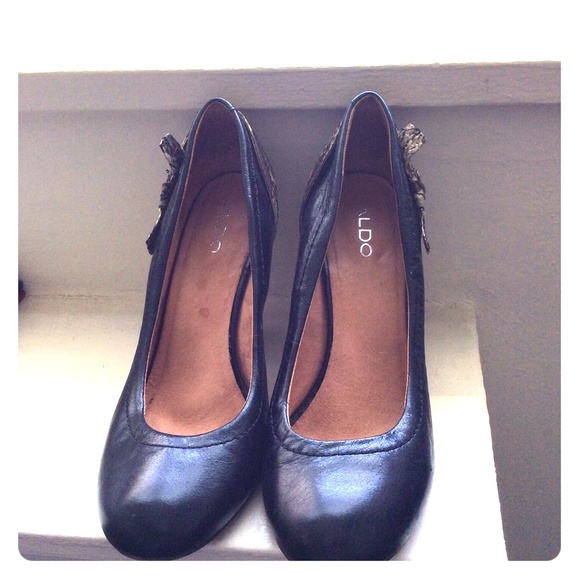 Aldo black pumps with bows.