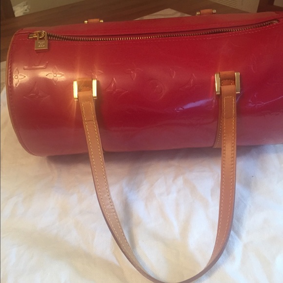 $80 on MERC 💢 Louis Vuitton red vernis bag