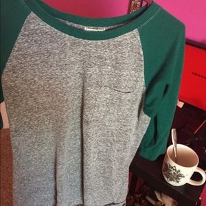 Baseball tee with pocket