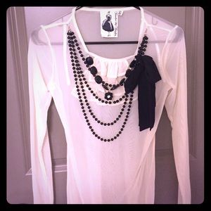Beige sheer top with black accent, NWOT!