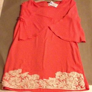 Peach Bell sleeved plus size top with lace.