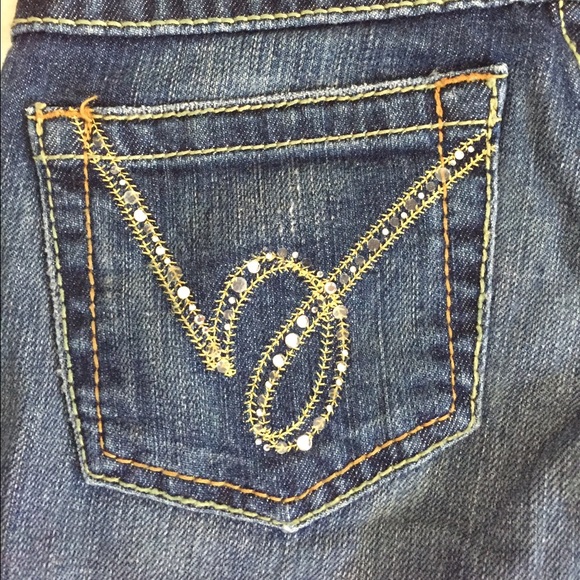 Bebe jean capris size 25 with embellished pockets