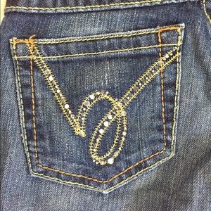 Bebe jean capris size 25 with embellished pockets