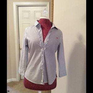 Hollister med striped shirt blue and white