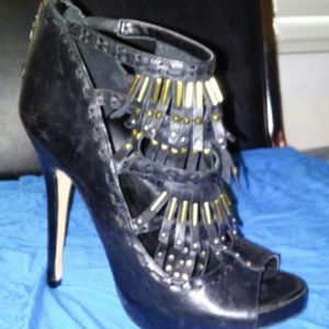 Black fringe heels