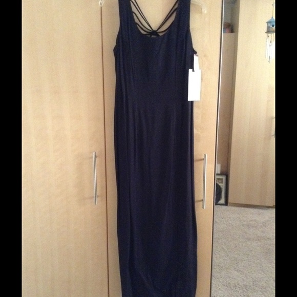 Subtle Dresses & Skirts - NWT Size 10 long black dress with cute back detail
