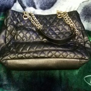 Black bag with gold chain
