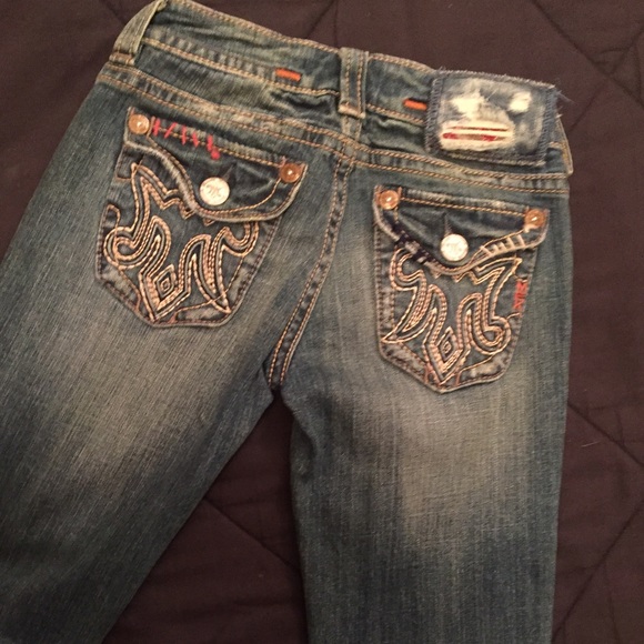 MEK Denim jeans worn lightly