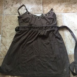 Tank top brown in color slightly worn.