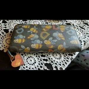 Authentic Dooney and Bourke zip wallet bees