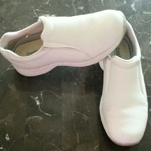 Gently worn white nursing shoes