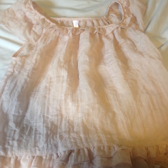 Light pink flowy blouse with ruffles