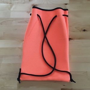 Authentic Triangl swimsuit bag/backpack.