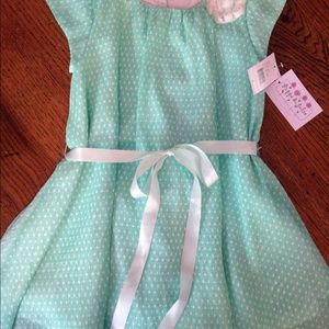 Girl's mint-green dress with satin bow Size 8