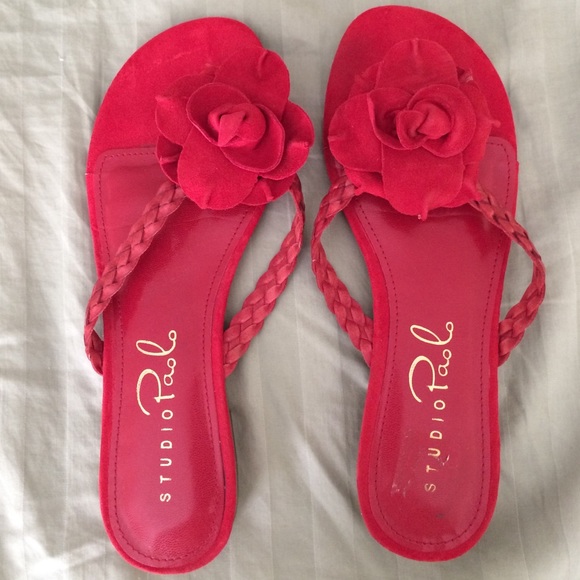 Red Sandals leather with man made upper.