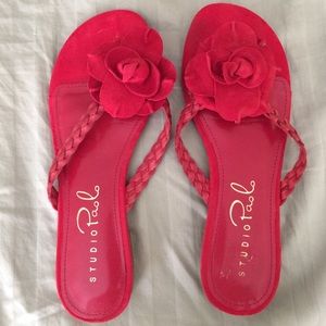 Red Sandals leather with man made upper.