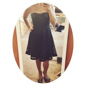 Black strapless dress by Annabella