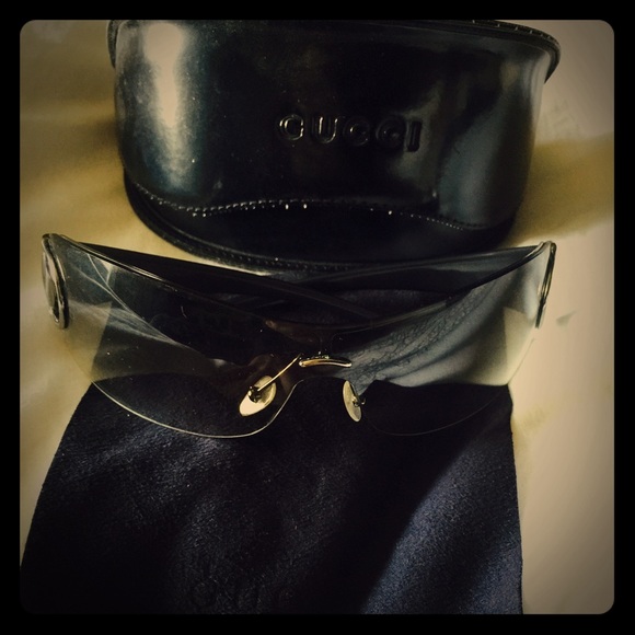 Grey and silver side Good condition Gucci glasses