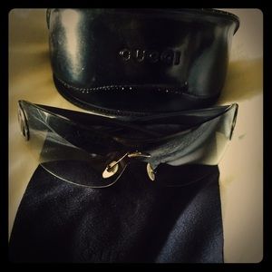 Grey and silver side Good condition Gucci glasses