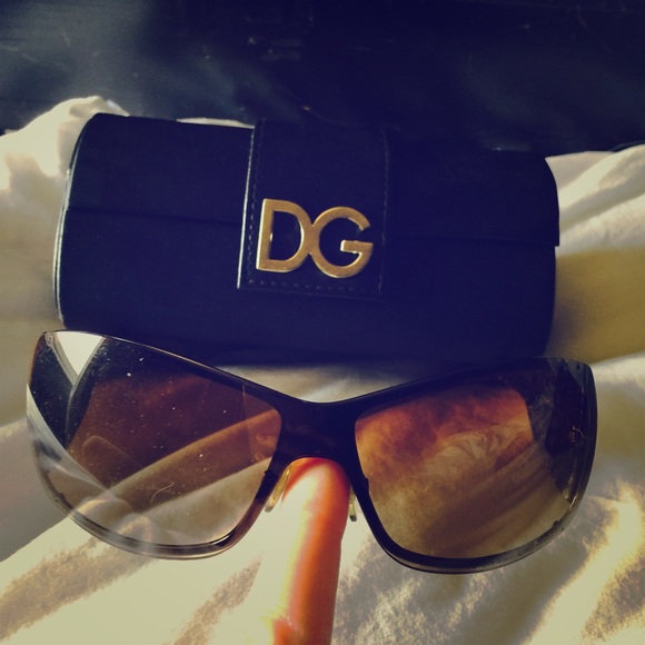 Gently worn Sexy DG sunglasses grey tortuous sides