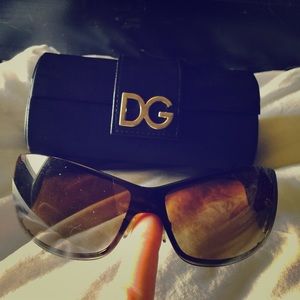 Gently worn Sexy DG sunglasses grey tortuous sides