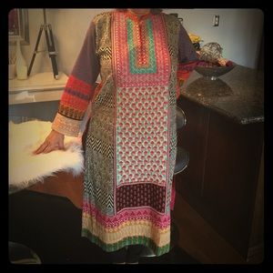 Custom Indian tunic with intricate embroidery.