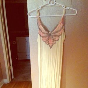 NWT. Butterfly tight fitted dress with back tie.