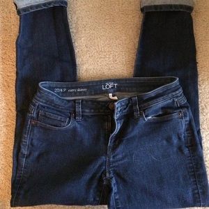 LOFT Dark wash skinny ankle jeans.