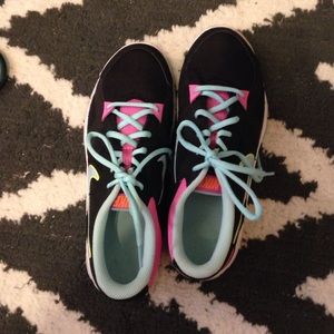 Multi color Nike training shoes.