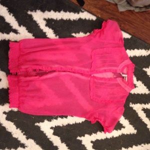A pink shear shirt.