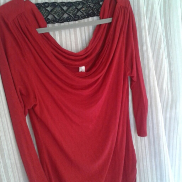 Very nice red top with glitzy black strip on back
