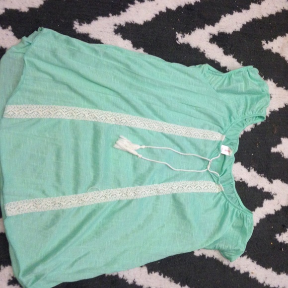 Sea green blouse.